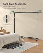 SONGMICS Clothes Rack with Wheels, Heavy-Duty Clothing Rack for Hanging Clothes, Portable, 17.7 x (63-78.7) x 63.6 Inches, with Extendable Hanging Rail, 330 lb Load Capacity, Black UHSR175B01